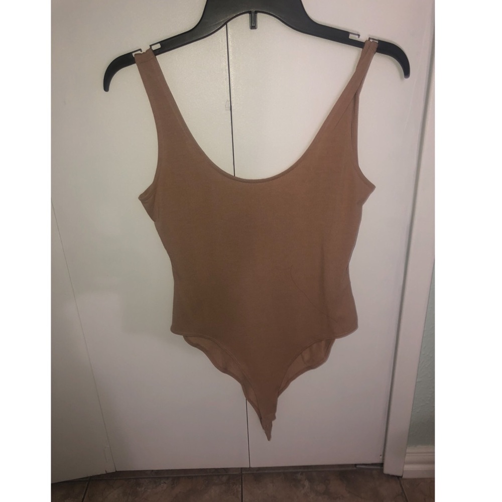 Nude body suit